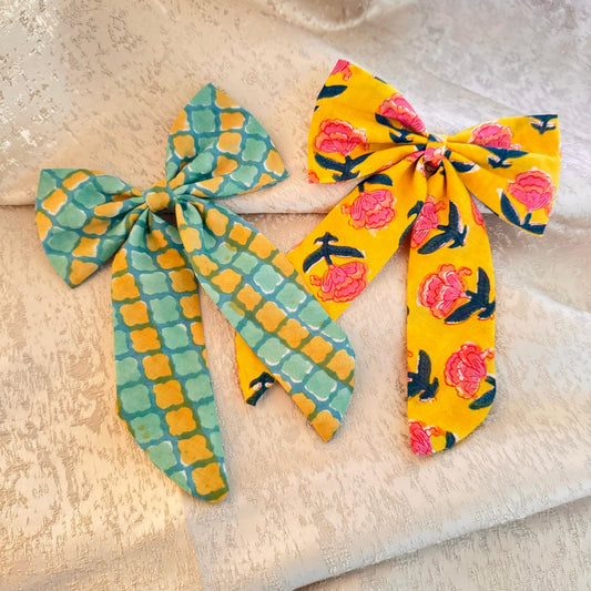 A woman wearing a bow floral cotton 