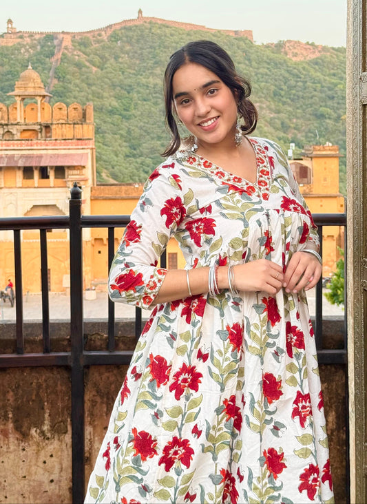  A woman wearing a blue floral cotton Long kurti