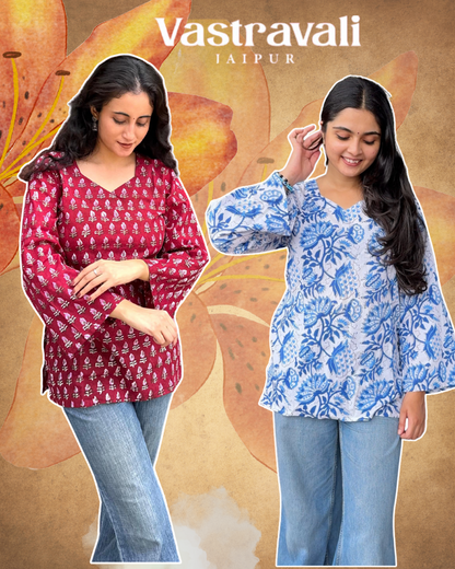 Two women wearing patterned tops with 'Vastravali Jaipur' branding on a decorative background.